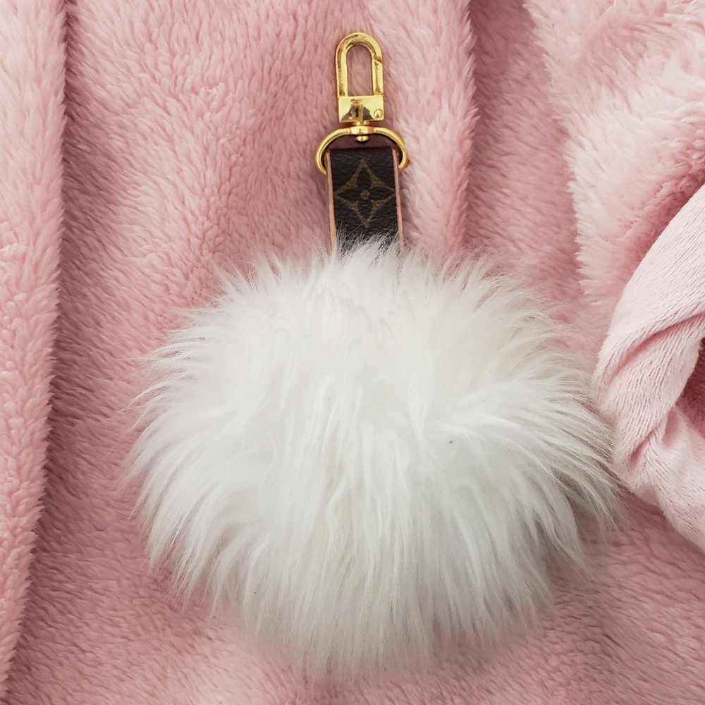 White puffball purse accessory